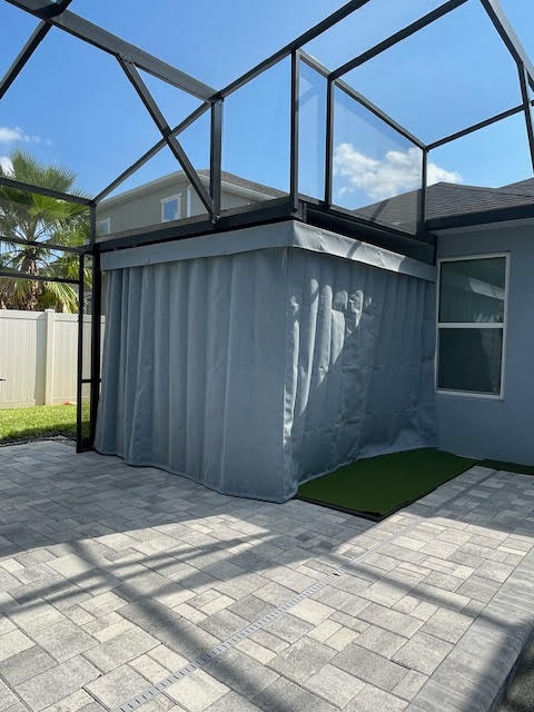 Grey privacy curtains creating enclosed corner